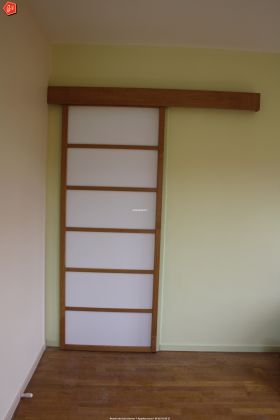 Pose de porte en galandage style Japonais